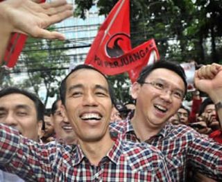 Pasangan Jokowi-Ahok yang diusung oleh PDIP dan Partai Gerindra saat Pilgub DKI Jakarta. (Antara/Yudhi Mahatma)