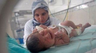 Seorang Bayi yang Baru Lahir (inet) (Foto: islamtimes.org)