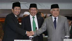 Menteri Agama Lukman Hakim Syaifuddin (tengah), bersama Wamenag Nazaruddin Umar (kiri), dan Ketua MUI Din Syamsuddin (kanan).  (tempo.co)
