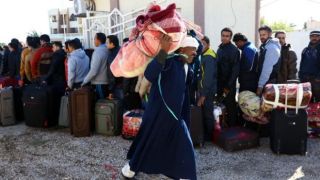 Warga Mesir yang kembali dari Libya (bbc.co.uk)