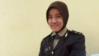 Bripda Rizka Munawaroh, Anggota Polwan di Polda Sumatera Selatan ini hafal 20 Juz Alquran. (okezone.com)