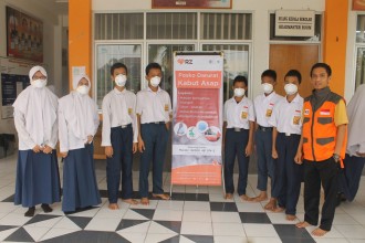 Kabut asap di Pekanbaru telah menyebabkan proses belajar mengajar terhenti.  (Rena/rz)