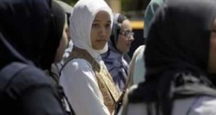 Imane Boudlal mengenakan jilbab putih (AP)